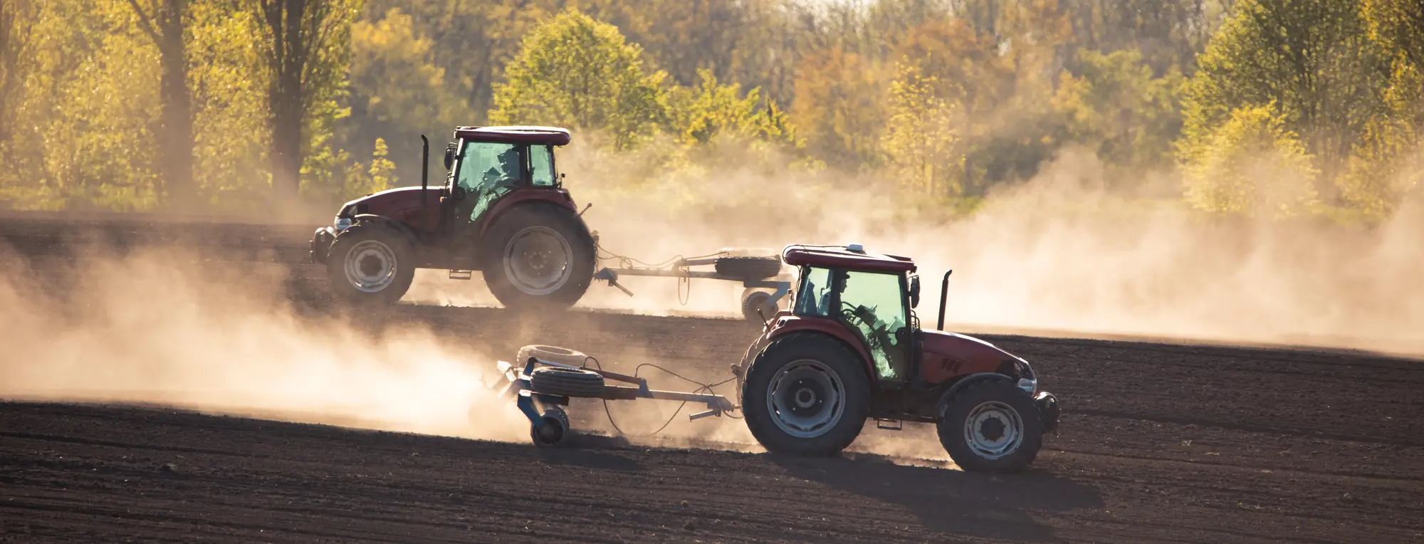 Two tractors preparing a field in autumn